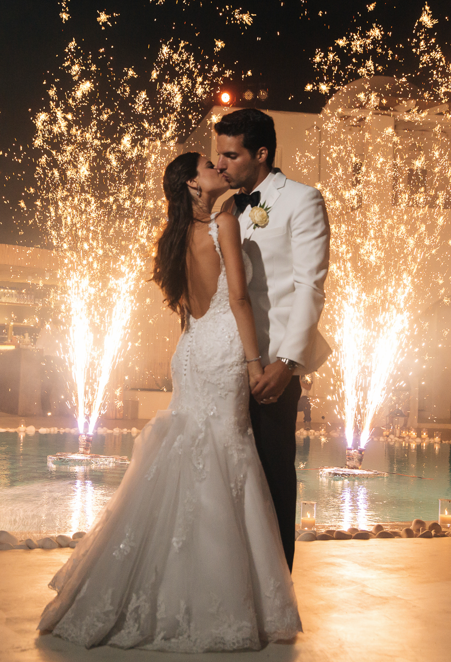 Candlelit proposal setting above the Santorini caldera